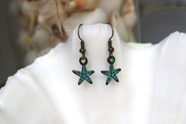Load image into Gallery viewer, Bronze blue patina starfish earrings
