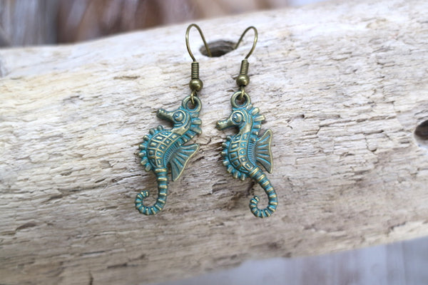 Load image into Gallery viewer, Bronze green patina seahorse earrings
