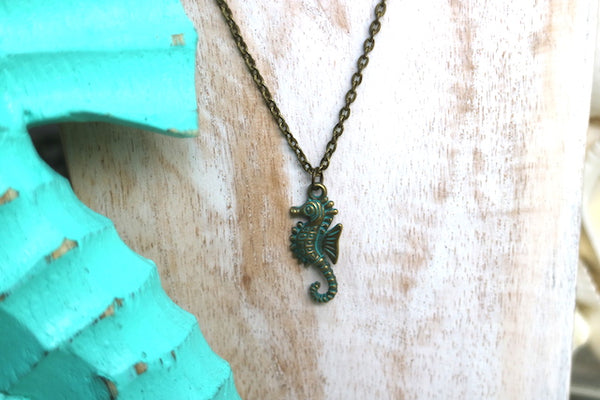 Load image into Gallery viewer, Bronze green patina vintage seahorse necklace
