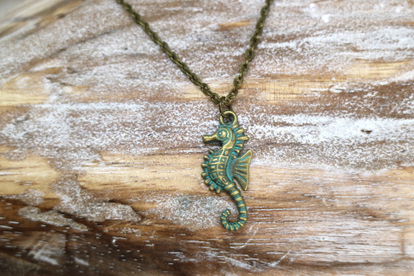 Load image into Gallery viewer, Bronze green patina vintage seahorse necklace
