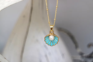 Children's blue and gold shell and pearl necklace