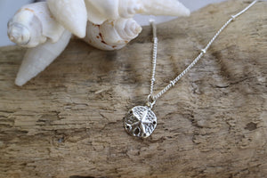 Children's sterling silver sand dollar shell necklace