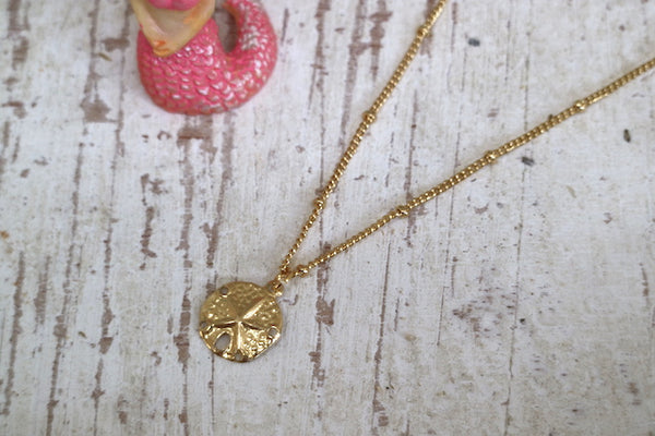 Load image into Gallery viewer, Children&#39;s 14k gold filled sand dollar shell necklace
