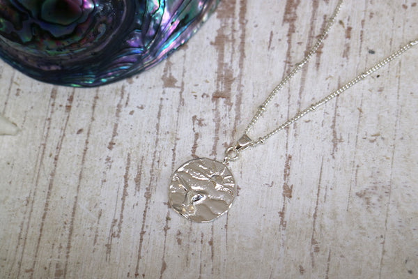 Load image into Gallery viewer, Children&#39;s silver sun and whale tail ocean necklace
