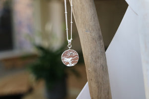 Children's silver sun and whale tail ocean necklace