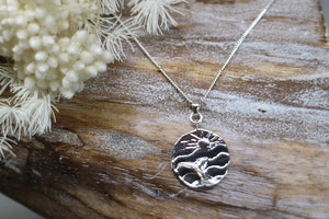 Children's silver sun and whale tail ocean necklace