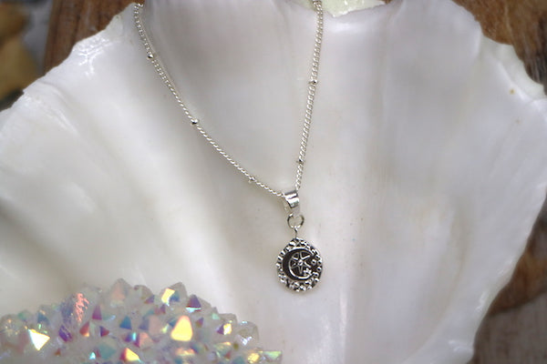 Load image into Gallery viewer, Children&#39;s moon and star silver necklace with cubic zirconia
