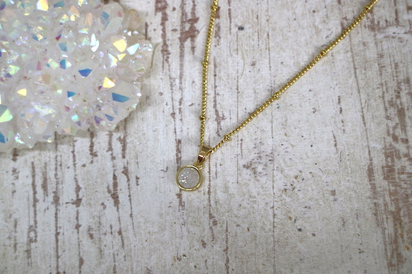 Load image into Gallery viewer, White druzy quartz gold necklace
