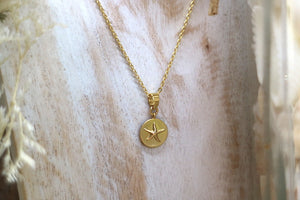 Gold starfish coin necklace