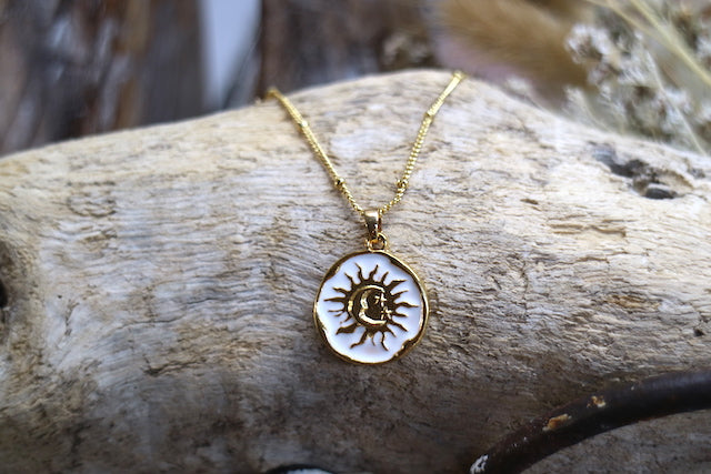 Gold and white moon and sun pendant necklace