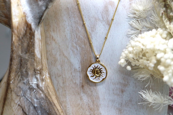 Load image into Gallery viewer, Gold and white moon and sun pendant necklace
