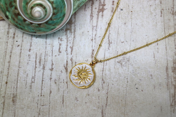 Load image into Gallery viewer, Gold and white moon and sun pendant necklace
