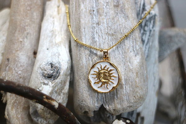 Load image into Gallery viewer, Gold and white moon and sun pendant necklace
