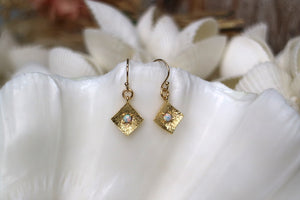 White opal gold earrings