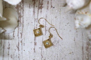 White opal gold earrings