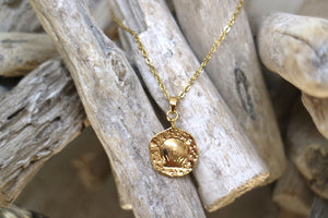 Gold shell coin pendant necklace