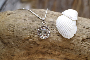 Silver shell coin pendant necklace