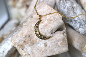 Gold moon pendant with opal stars necklace