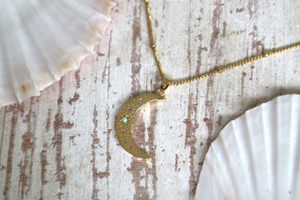 Load image into Gallery viewer, Gold moon pendant with opal stars necklace
