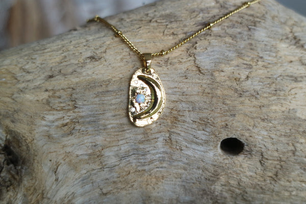 Load image into Gallery viewer, White opal and cubic zirconia moon and stars gold necklace
