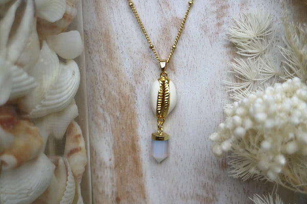 Load image into Gallery viewer, Opalite crystal point and cowrie shell gold necklace
