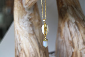 Opalite crystal point and cowrie shell gold necklace