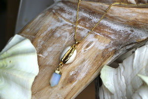 Opalite crystal point and cowrie shell gold necklace