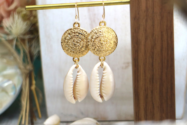 Load image into Gallery viewer, Cowrie shell and gold rune symbol earrings
