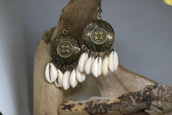 Load image into Gallery viewer, Cowrie shell and antique bronze bohemian earrings
