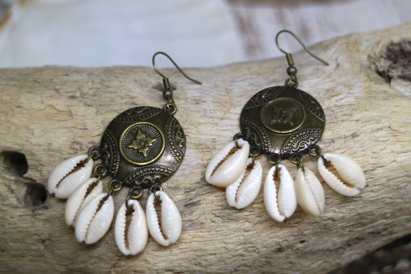 Load image into Gallery viewer, Cowrie shell and antique bronze bohemian earrings
