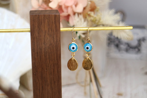 Load image into Gallery viewer, Blue evil eye protection gold earrings
