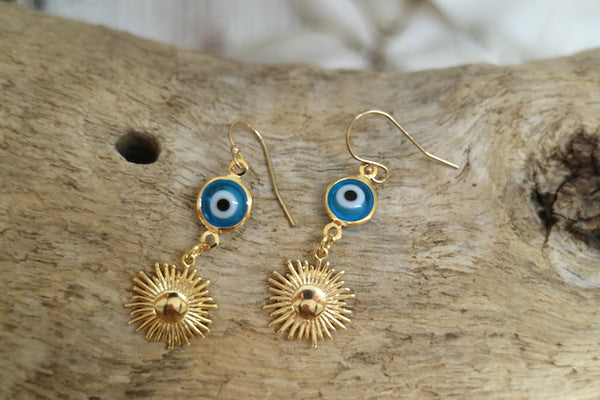Load image into Gallery viewer, Blue evil eye protection and sun gold earrings

