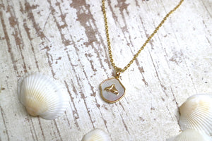 Mother of pearl and gold whale tail necklace
